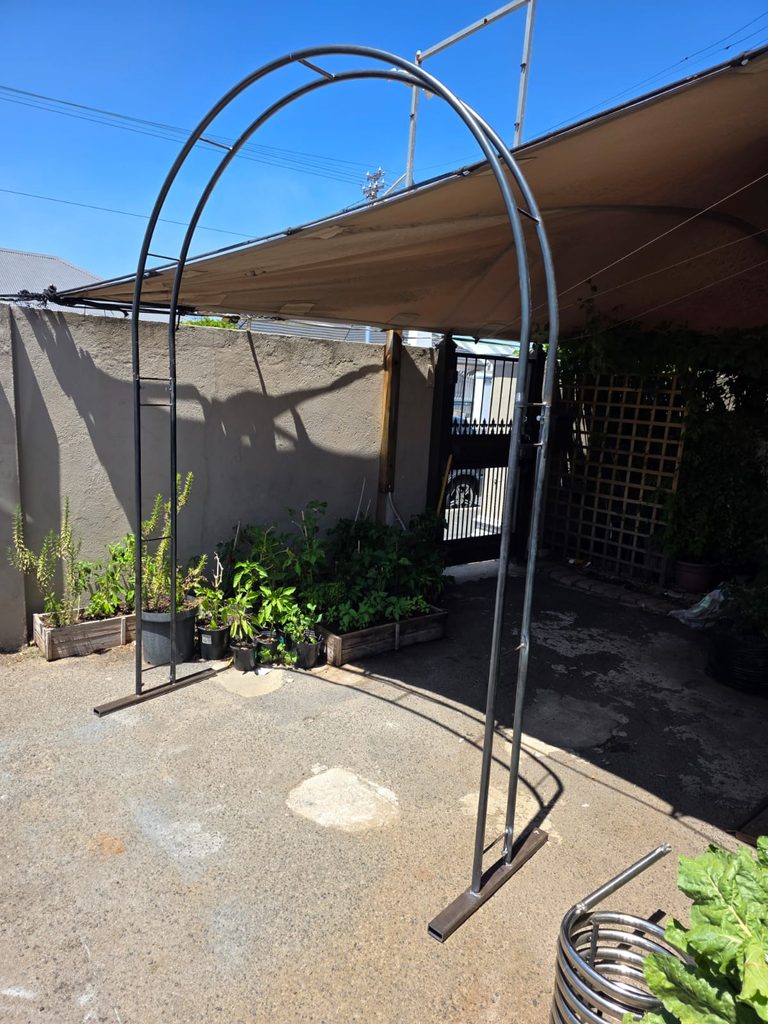 Tall curved steel event backdrop frame