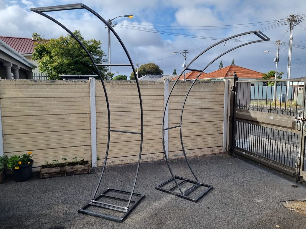 Pair of curved steel backdrop stands